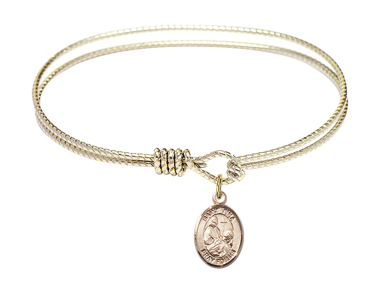 Cable Bangle Bracelet with a Saint Fina Charm