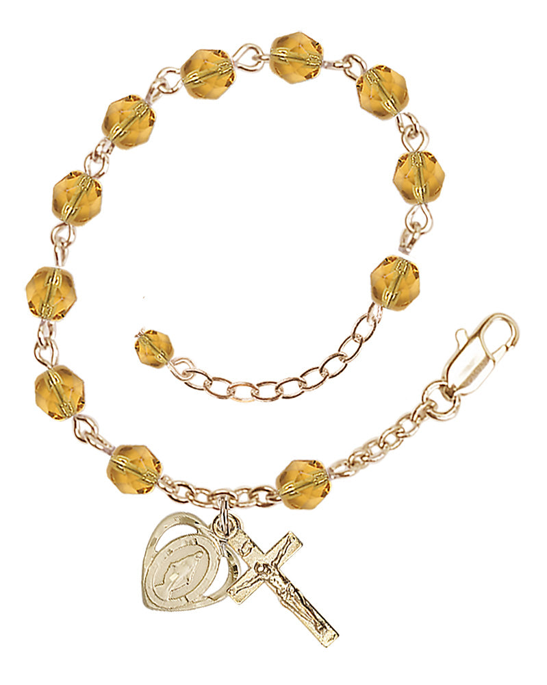 6mm Fire Polished Miraculous Heart Rosary Bracelet - Gold Plate - November - Topaz