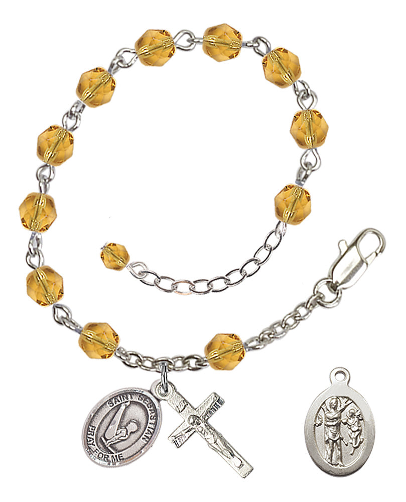Saint Sebastian Gymnastics Rosary Bracelet - Silver Plate - November - Topaz