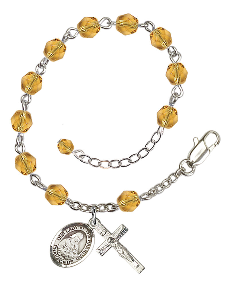 Our Lady of the Railroad Rosary Bracelet - Silver Plate - November - Topaz