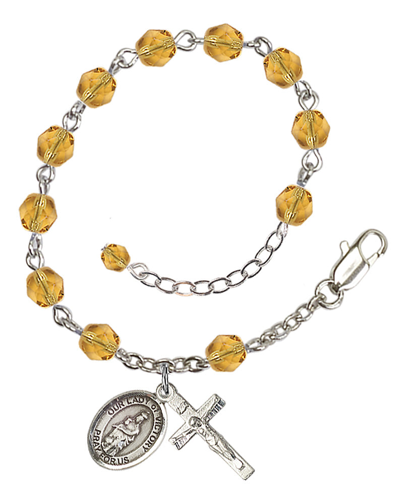 Our Lady of Victory Rosary Bracelet - Silver Plate - November - Topaz