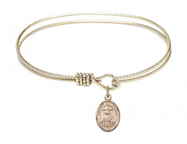 Cable Bangle Bracelet with a Saint Andrew Kim Taegon Charm - Gold