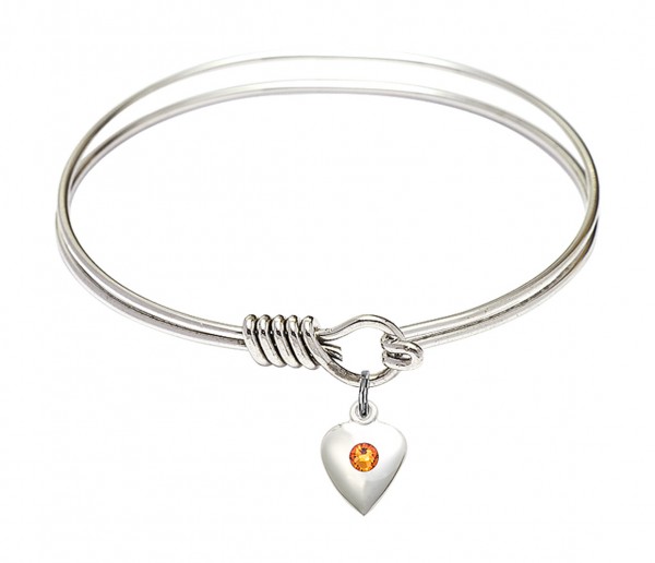 Smooth Bangle Bracelet with a Birthstone Puff Heart Charm - Topaz