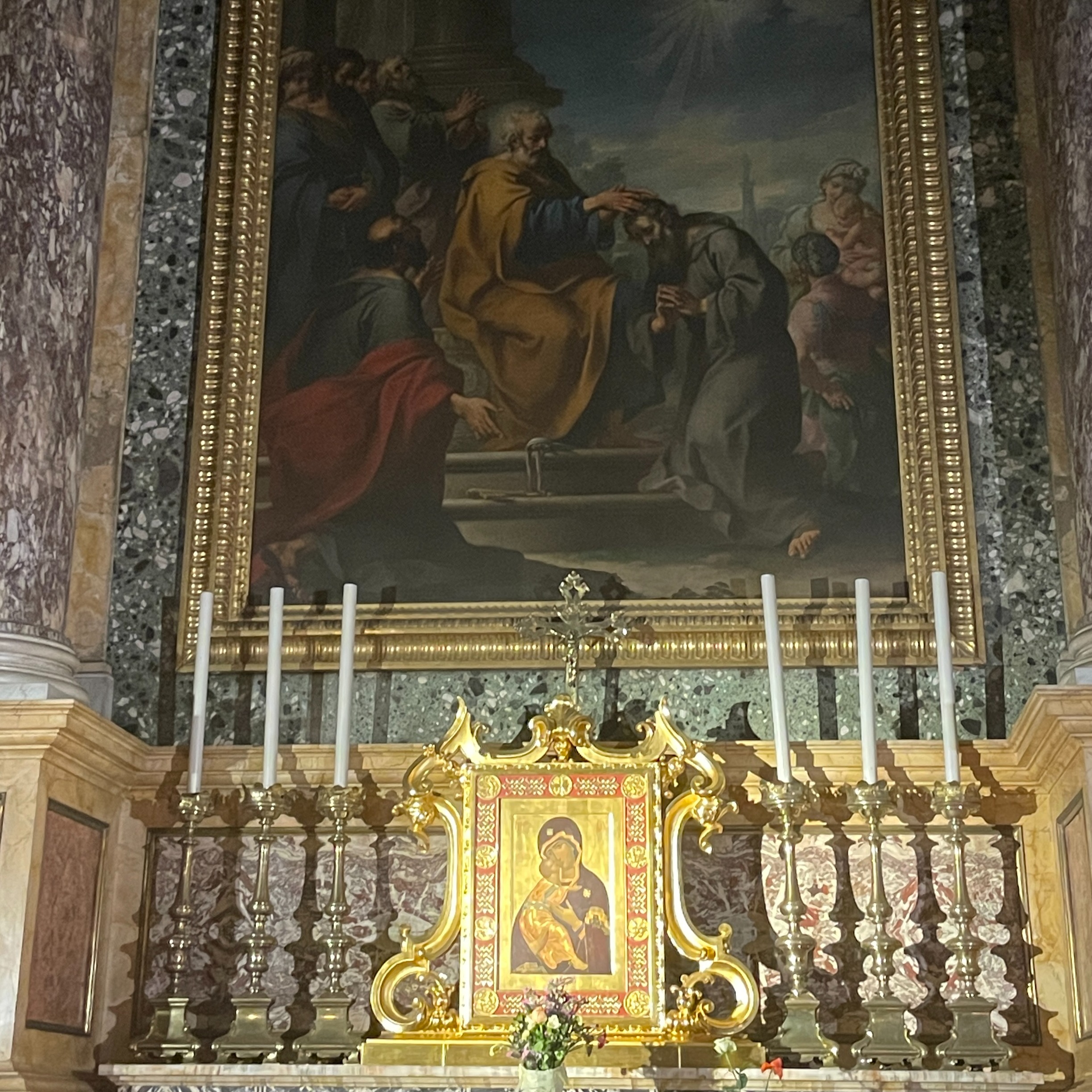 Catholic Prayers: Why do Catholics use statues, paintings, and light candles as part of their faith?