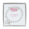 Pearl Stretch Bracelet with Crystal Cross and Heart