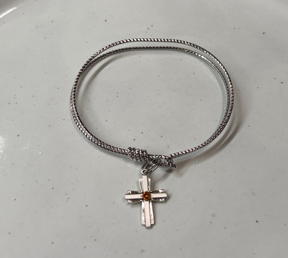 Cable Bangle Bracelet with a Cross Charm