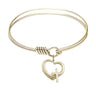 Smooth Bangle Bracelet with a Heart and Cross Charm