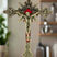 Gold tone with red accents standing crucifix