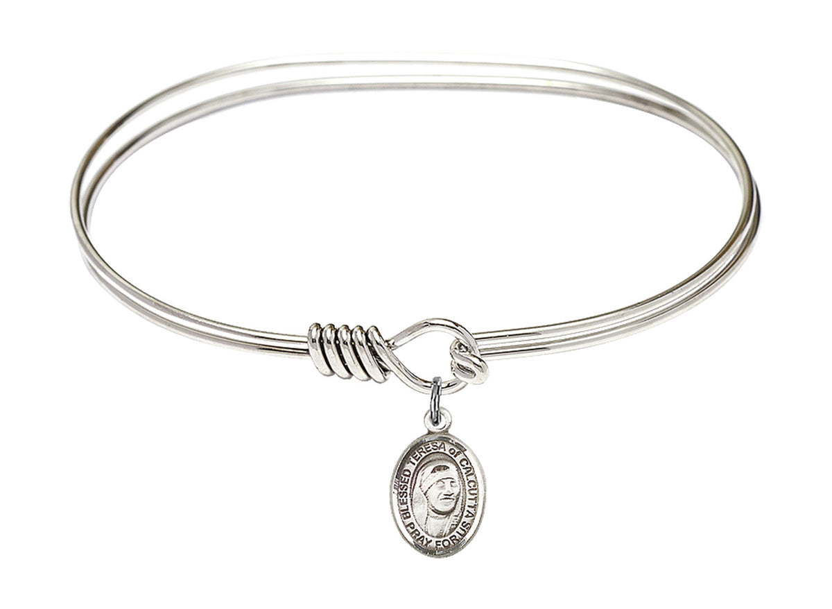 Smooth bangle bracelet with St. Teresa of Calcutta charm