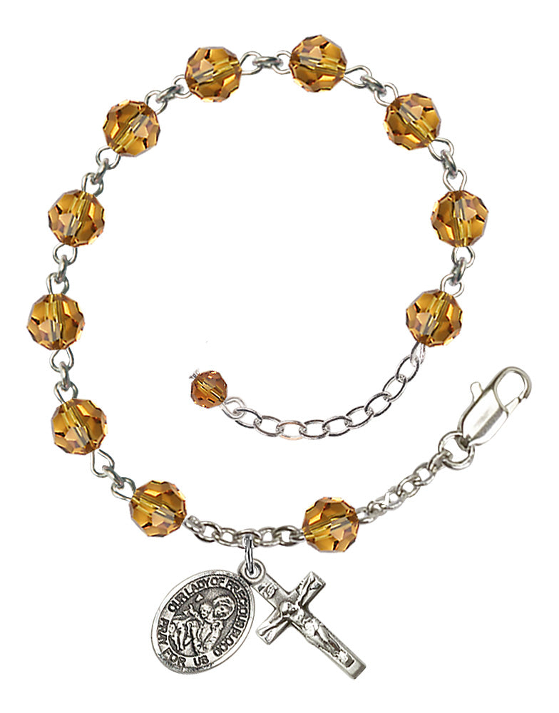 Our Lady of Precious Blood Rosary Bracelet - Sterling Silver - November - Topaz
